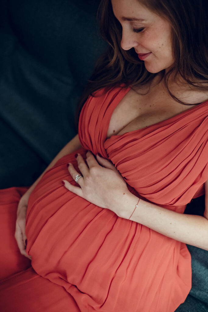 pregnant woman in red dress