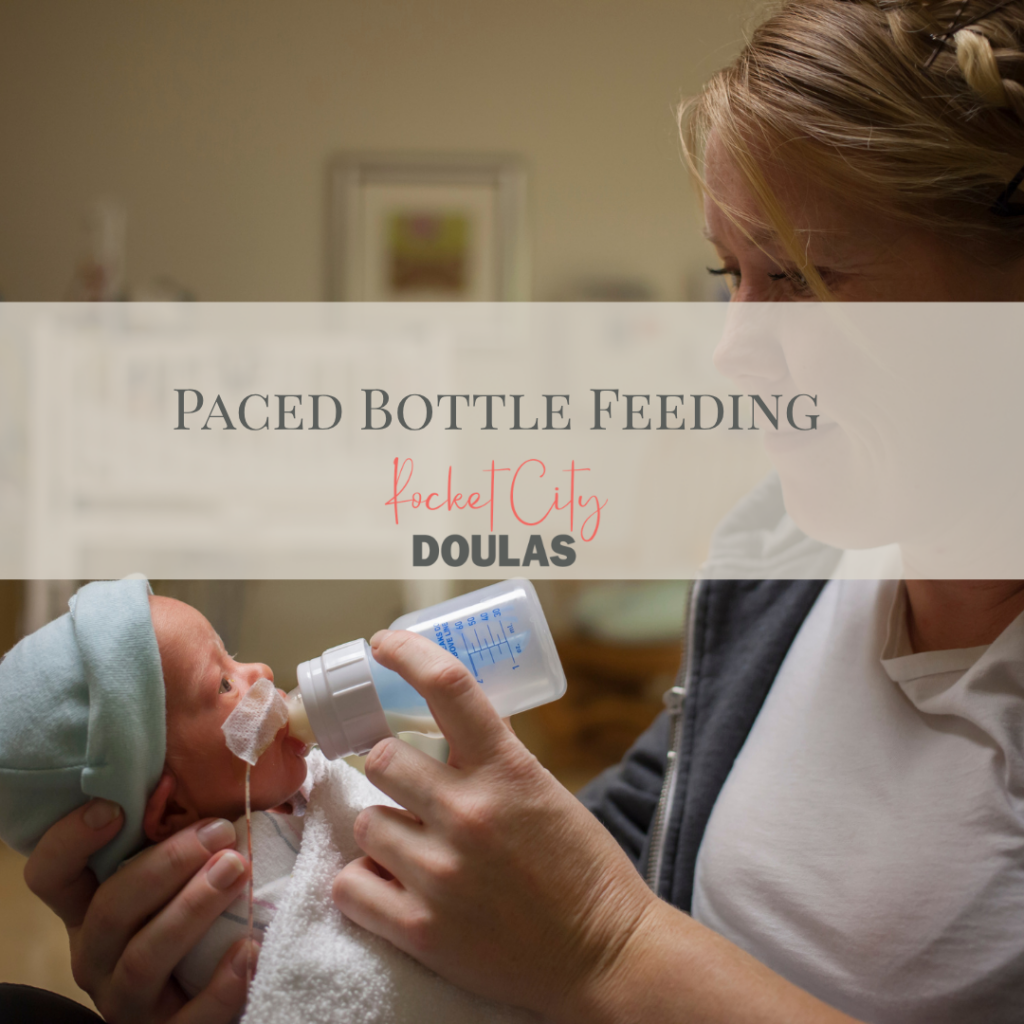 "Mother practicing paced bottle feeding with newborn"